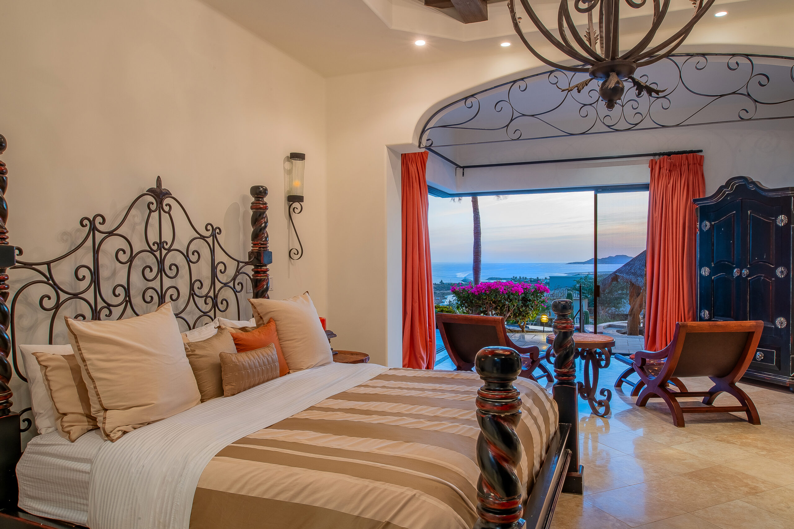 Master bedroom with ocean view in a Los Cabos villa managed by AMG Property Services